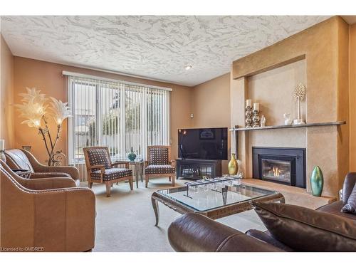 77 Adriatic Boulevard, Stoney Creek, ON - Indoor Photo Showing Living Room With Fireplace
