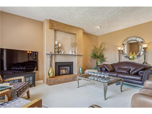 77 Adriatic Boulevard, Stoney Creek, ON - Indoor Photo Showing Living Room With Fireplace