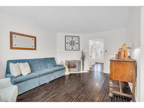 831 Laurier Avenue S, Milton, ON - Indoor Photo Showing Living Room With Fireplace