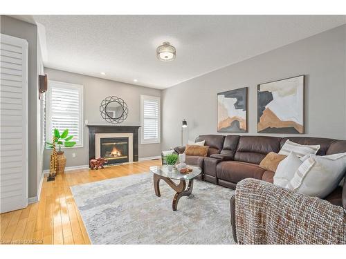 14 Arborglen Drive, Georgetown, ON - Indoor Photo Showing Living Room With Fireplace
