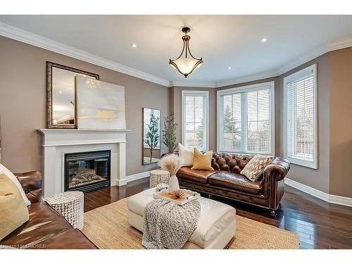 110 Holland Circle, Cambridge, ON - Indoor Photo Showing Living Room With Fireplace