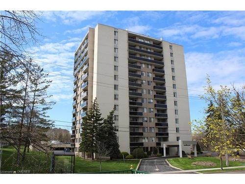 506-81 Millside Drive, Milton, ON - Outdoor With Balcony With Facade