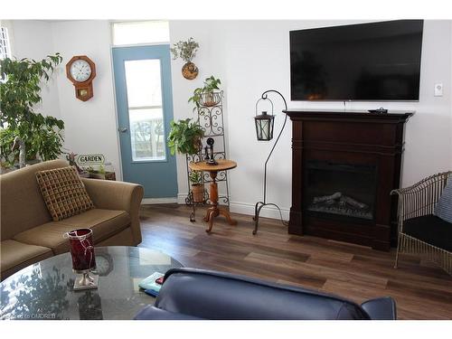 506-81 Millside Drive, Milton, ON - Indoor Photo Showing Living Room With Fireplace