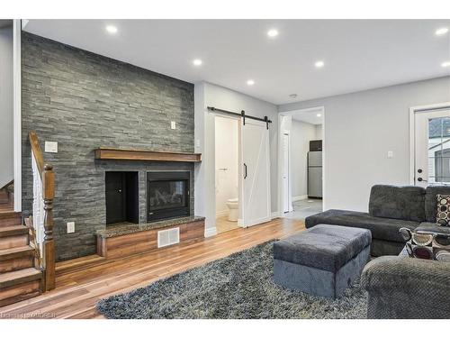 196 Hess Street N, Hamilton, ON - Indoor Photo Showing Living Room With Fireplace