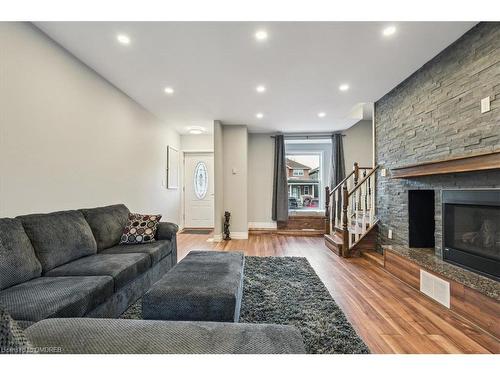 196 Hess Street N, Hamilton, ON - Indoor Photo Showing Living Room With Fireplace