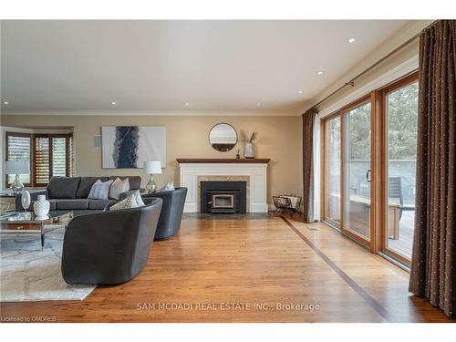 3240 River Road, Haldimand, ON - Indoor Photo Showing Living Room With Fireplace