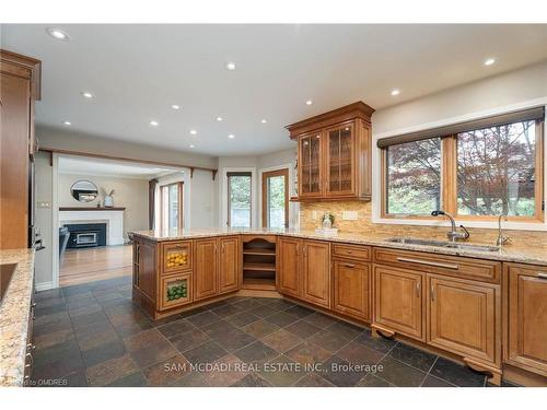 3240 River Road, Haldimand, ON - Indoor Photo Showing Kitchen With Fireplace With Double Sink