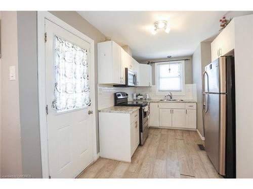 6295 Ker Street, Niagara Falls, ON - Indoor Photo Showing Kitchen With Double Sink