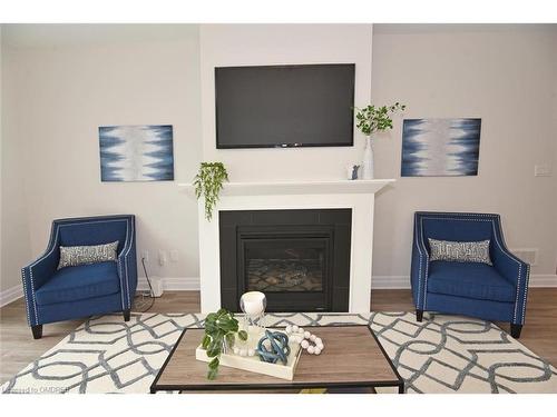 403 Breakwater Boulevard, Port Stanley, ON - Indoor Photo Showing Living Room With Fireplace