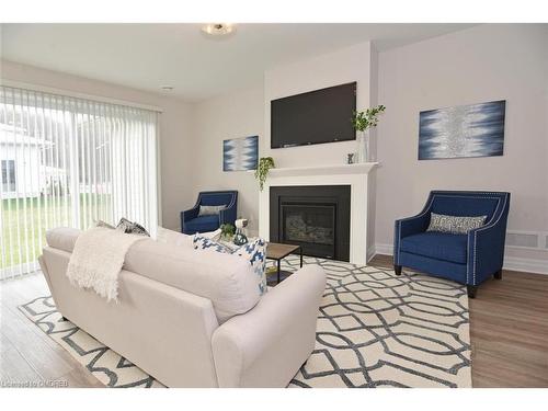 403 Breakwater Boulevard, Port Stanley, ON - Indoor Photo Showing Living Room With Fireplace