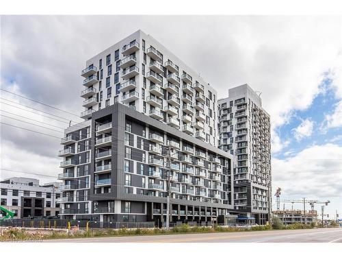 203-345 Wheat Boom Drive, Oakville, ON - Outdoor With Balcony With Facade