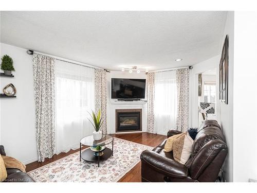 61 Lawnhurst Drive, Hamilton, ON - Indoor Photo Showing Living Room With Fireplace
