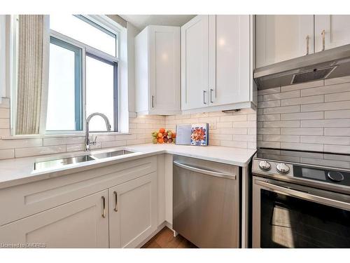 1805-5250 Lakeshore Road, Burlington, ON - Indoor Photo Showing Kitchen With Double Sink