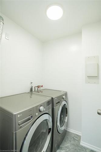 508-390 Dixon Road, Toronto, ON - Indoor Photo Showing Laundry Room