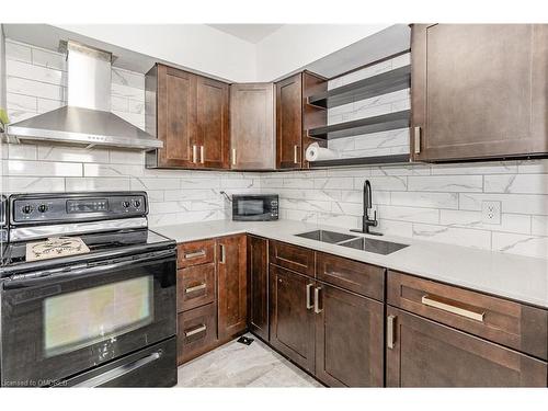 140 Gage Avenue N, Hamilton, ON - Indoor Photo Showing Kitchen With Double Sink