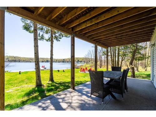 121 North Deer Lake Road, Port Sydney, ON - Outdoor With Body Of Water With Deck Patio Veranda With Exterior
