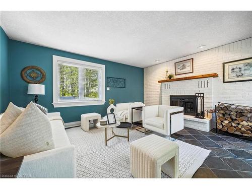 11485 First Line, Milton, ON - Indoor Photo Showing Living Room With Fireplace