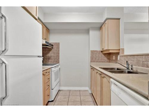 303-710 Humberwood Boulevard, Toronto, ON - Indoor Photo Showing Kitchen With Double Sink
