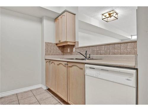303-710 Humberwood Boulevard, Toronto, ON - Indoor Photo Showing Kitchen With Double Sink
