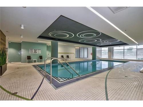 813-55 Speers Road, Oakville, ON - Indoor Photo Showing Other Room With In Ground Pool
