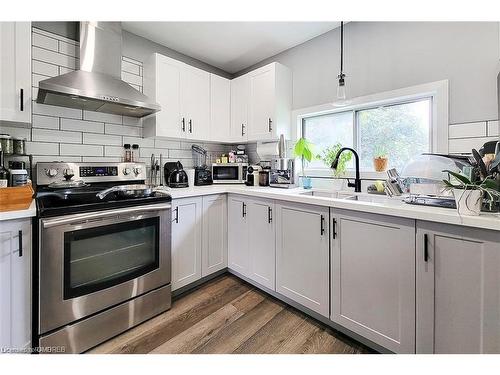 67 East 13Th Street, Hamilton, ON - Indoor Photo Showing Kitchen With Double Sink