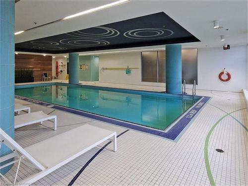 514-55 Speers Road, Oakville, ON - Indoor Photo Showing Other Room With In Ground Pool