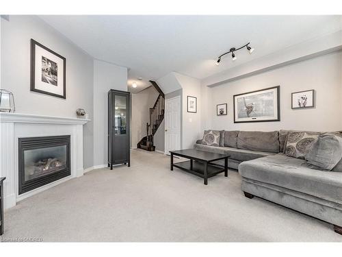 2041 Fiddlers Way, Oakville, ON - Indoor Photo Showing Living Room With Fireplace