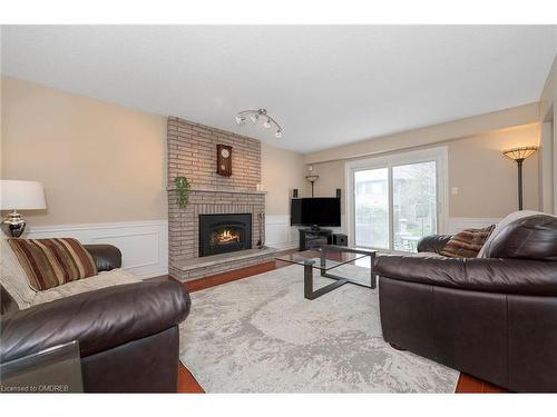 65 Springfield Boulevard, Ancaster, ON - Indoor Photo Showing Living Room With Fireplace
