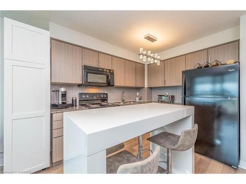 802-80 Esther Lorrie Drive, Toronto, ON - Indoor Photo Showing Kitchen With Double Sink