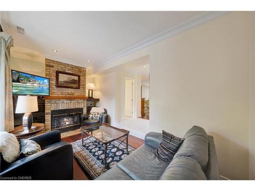 2-1100 Queen Street W, Mississauga, ON - Indoor Photo Showing Living Room With Fireplace