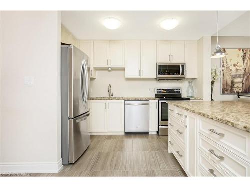 101-640 Sauve Street, Milton, ON - Indoor Photo Showing Kitchen With Upgraded Kitchen