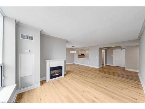 606-442 Maple Avenue, Burlington, ON - Indoor Photo Showing Living Room With Fireplace