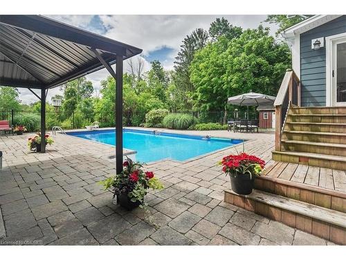 556 Parkside Drive E, Waterdown, ON - Outdoor With In Ground Pool With Deck Patio Veranda