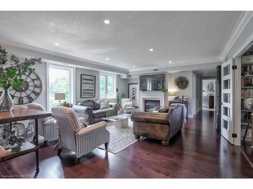 306-390 Upper Middle Road E, Oakville, ON - Indoor Photo Showing Living Room With Fireplace