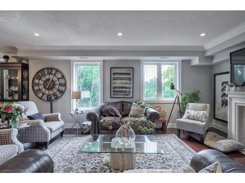 306-390 Upper Middle Road E, Oakville, ON - Indoor Photo Showing Living Room With Fireplace
