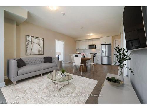 308-3200 William Coltson Avenue, Oakville, ON - Indoor Photo Showing Living Room