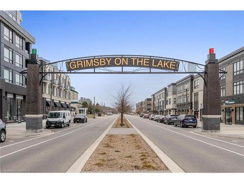 207-10 Esplanade Lane, Grimsby, ON - Outdoor With Body Of Water