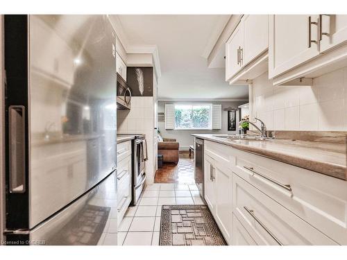 104-482 James Street N, Hamilton, ON - Indoor Photo Showing Kitchen With Double Sink