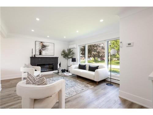 14 Glencairn Drive, St. Catharines, ON - Indoor Photo Showing Living Room With Fireplace