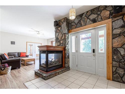 146 Oke Drive, Burk'S Falls, ON - Indoor Photo Showing Living Room With Fireplace