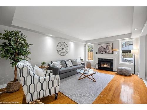 973 Knotty Pine Grove, Mississauga, ON - Indoor Photo Showing Living Room With Fireplace