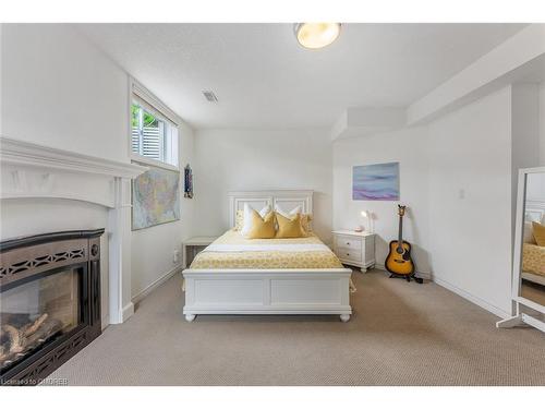3-4 Reddington Drive, Caledon, ON - Indoor Photo Showing Bedroom With Fireplace