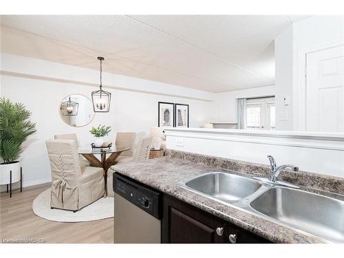 304-1487 Maple Avenue, Milton, ON - Indoor Photo Showing Kitchen With Double Sink