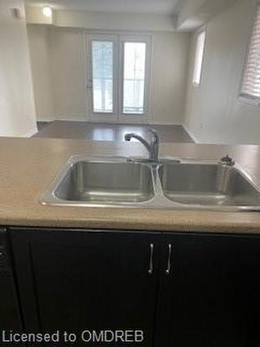 1-2563 Sixth Line, Oakville, ON - Indoor Photo Showing Kitchen With Double Sink