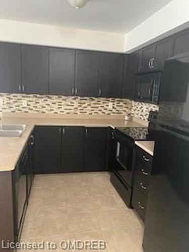 1-2563 Sixth Line, Oakville, ON - Indoor Photo Showing Kitchen With Double Sink With Upgraded Kitchen