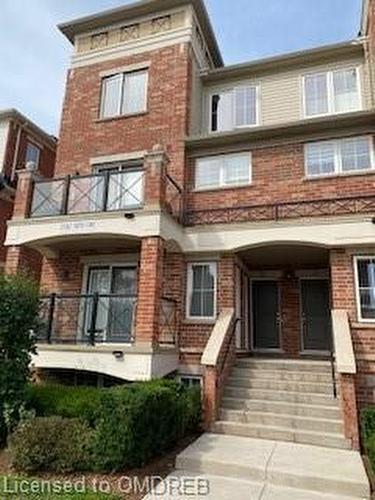 1-2563 Sixth Line, Oakville, ON - Outdoor With Balcony With Facade