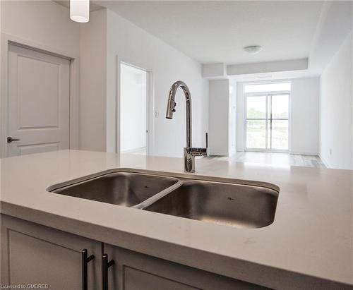 234-10 Mallard Trail E, Hamilton, ON - Indoor Photo Showing Kitchen With Double Sink