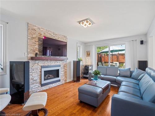 2215 Springfield Court, Mississauga, ON - Indoor Photo Showing Living Room With Fireplace