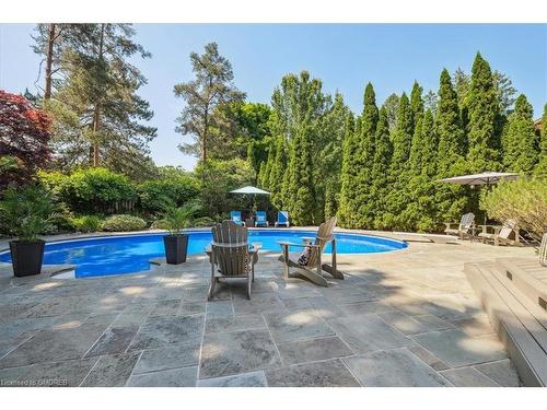 1301 Bunsden Avenue, Mississauga, ON - Outdoor With In Ground Pool With Backyard