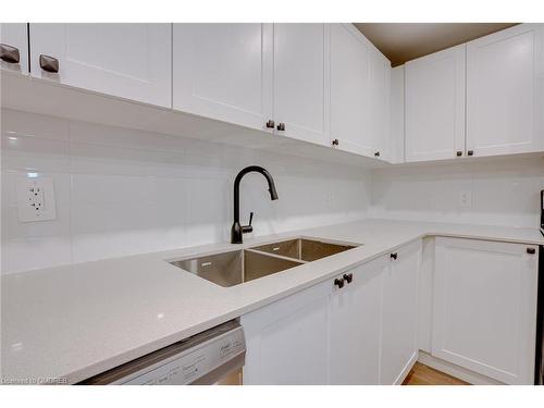 A-201-1083 Main Street E, Hamilton, ON - Indoor Photo Showing Kitchen With Double Sink